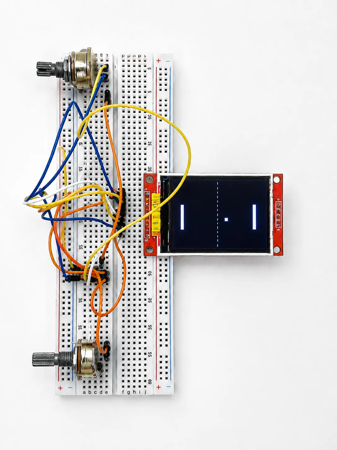 Breadboard Pong on a TFT display, driven by a Tiva ARM Cortex-M microcontroller